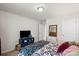 Inviting bedroom featuring patterned bedding and soft lighting at 9533 Silverdale Ln, Charlotte, NC 28269