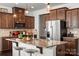 Beautiful kitchen featuring granite countertops, stainless steel appliances and a center island with seating at 9533 Silverdale Ln, Charlotte, NC 28269