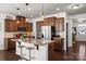 Well-equipped kitchen featuring granite counters, a center island with seating, and stainless steel appliances at 9533 Silverdale Ln, Charlotte, NC 28269