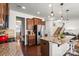 Modern kitchen featuring granite countertops, stainless steel appliances, and a breakfast bar at 9533 Silverdale Ln, Charlotte, NC 28269