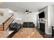 Spacious living room with a fireplace, plush seating, and modern decor at 9533 Silverdale Ln, Charlotte, NC 28269