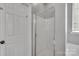Clean and bright bathroom featuring glass enclosed shower and neutral walls and flooring at 9614 Turning Wheel Dr, Charlotte, NC 28214