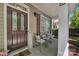 Inviting front porch with seating, a decorative door, and a 'Welcome' sign, enhancing curb appeal at 9614 Turning Wheel Dr, Charlotte, NC 28214