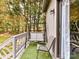 Relaxing deck with faux grass, outdoor seating, and a swing at 100 Willow Run Dr # 26, Gastonia, NC 28056