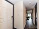 Inviting entryway featuring hardwood floors and a view into the bright living area at 100 Willow Run Dr # 26, Gastonia, NC 28056