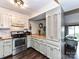 Well-lit kitchen featuring wood countertops, stainless steel appliances, and white subway tile backsplash at 100 Willow Run Dr # 26, Gastonia, NC 28056