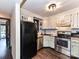 Well-lit kitchen featuring wood countertops, stainless steel appliances, and white subway tile backsplash at 100 Willow Run Dr # 26, Gastonia, NC 28056