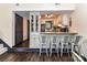 Bright and inviting kitchen with light cabinets, modern appliances, and stylish breakfast bar seating at 100 Willow Run Dr # 26, Gastonia, NC 28056