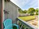 Cozy front porch with an Adirondack chair is a perfect spot to relax and enjoy the outdoors at 100 Willow Run Dr # 26, Gastonia, NC 28056