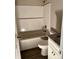 Bathroom showcasing a shower-tub combo and granite vanity at 1024 Short St, Salisbury, NC 28144
