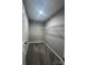 Spacious walk-in closet with carpet, overhead lighting and wire shelving for optimal storage solutions at 1024 Short St, Salisbury, NC 28144