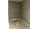 Empty closet with vinyl flooring and wire shelving offers extra space for storage at 1024 Short St, Salisbury, NC 28144