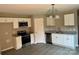 Updated kitchen with stainless steel appliances, granite counters, and ample cabinet space at 1024 Short St, Salisbury, NC 28144
