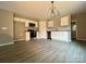 Kitchen area showcasing stainless steel appliances, granite countertops, and modern flooring at 1024 Short St, Salisbury, NC 28144