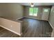 View of living room with wood flooring and a granite countertop at 1024 Short St, Salisbury, NC 28144