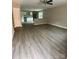 Spacious living room with modern flooring that flows into an open kitchen area at 1024 Short St, Salisbury, NC 28144