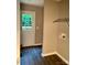 Practical mudroom with shelving and a door to the backyard at 1024 Short St, Salisbury, NC 28144
