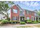 Charming brick-front townhome with a well-manicured lawn and inviting entrance at 10378 Alexander Martin Ave, Charlotte, NC 28277