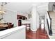 Open-concept interior featuring hardwood floors, neutral walls, and a seamless flow into the kitchen at 10378 Alexander Martin Ave, Charlotte, NC 28277