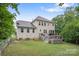 Large backyard with a deck that is perfect for relaxation and enjoying outdoor living at 1104 Snowbird Ln, Waxhaw, NC 28173