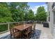 Outdoor deck with a dining table and chairs, perfect for entertaining at 1104 Snowbird Ln, Waxhaw, NC 28173
