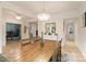Spacious dining room with ample lighting and views into other living spaces at 1104 Snowbird Ln, Waxhaw, NC 28173
