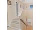 Upstairs hallway with wood floors and natural light at 1104 Snowbird Ln, Waxhaw, NC 28173