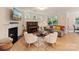 Inviting living room with fireplace, piano, and comfortable seating area at 1104 Snowbird Ln, Waxhaw, NC 28173