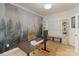 Bright office space featuring modern décor, desk, and built-in shelving at 1104 Snowbird Ln, Waxhaw, NC 28173