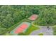 Aerial view of well-maintained community tennis courts, offering residents a great recreational amenity at 1104 Snowbird Ln, Waxhaw, NC 28173