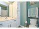 The bathroom features a sink, toilet, cabinet, and coordinated design, offering a clean and stylish space at 1113 Geyser Ct, Fort Mill, SC 29715