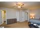 Bright bedroom with carpet, ceiling fan, and natural light, creating a comfortable and inviting atmosphere at 1113 Geyser Ct, Fort Mill, SC 29715