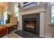 Close-up of a charming fireplace with decorative mantel and hearth, creating a focal point in the living area at 1113 Geyser Ct, Fort Mill, SC 29715