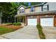 Attractive townhome with attached garage, neat landscaping, and inviting curb appeal at 1113 Geyser Ct, Fort Mill, SC 29715