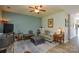Inviting living room with a cozy seating area, neutral color palette, and hardwood floors at 1113 Geyser Ct, Fort Mill, SC 29715