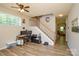 Spacious living room showcasing hardwood floors and staircase to the upper level at 1113 Geyser Ct, Fort Mill, SC 29715