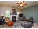 Cozy living room featuring a fireplace, comfortable seating, and neutral decor, perfect for relaxation at 1113 Geyser Ct, Fort Mill, SC 29715