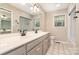 Bathroom features double vanity, natural light, and a shower and tub combo at 120 Mossy Rock Trl, Iron Station, NC 28080