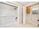 Bathroom with tub and shower combination and cabinet at 120 Mossy Rock Trl, Iron Station, NC 28080