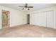 Bedroom featuring neutral walls, plush carpeting, and closet space at 120 Mossy Rock Trl, Iron Station, NC 28080