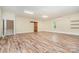 Bonus room with wooden floors, a barn door, and recessed lighting at 120 Mossy Rock Trl, Iron Station, NC 28080