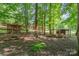 Established chicken coop setup with secure fencing, creating a safe and functional space for raising poultry at 120 Mossy Rock Trl, Iron Station, NC 28080