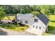 Charming home with a black metal roof, complemented by a spacious garage at 120 Mossy Rock Trl, Iron Station, NC 28080