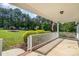 Inviting porch with beautiful views, complemented by lush landscaping at 120 Mossy Rock Trl, Iron Station, NC 28080
