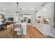 Open concept kitchen with an expansive island, modern stainless steel appliances, and plenty of countertop space at 12047 Lavinia Ln, Charlotte, NC 28277