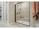 Contemporary shower featuring a glass enclosure, bench, and elegant tile work at 12047 Lavinia Ln, Charlotte, NC 28277