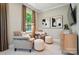 Relaxing sitting room with plush armchairs, natural light, and modern decor for a cozy retreat at 12051 Lavinia Ln, Charlotte, NC 28277