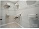 Organized walk-in closet with ample shelving and storage, perfect for keeping your wardrobe tidy at 12051 Lavinia Ln, Charlotte, NC 28277