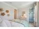 Calming bedroom with closet, dresser and decorative wall art at 12055 Lavinia Ln, Charlotte, NC 28277