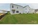 Backyard featuring a newly-sodded lawn, concrete patio and views of neighboring homes at 1278 Langston Ln, Salisbury, NC 28144